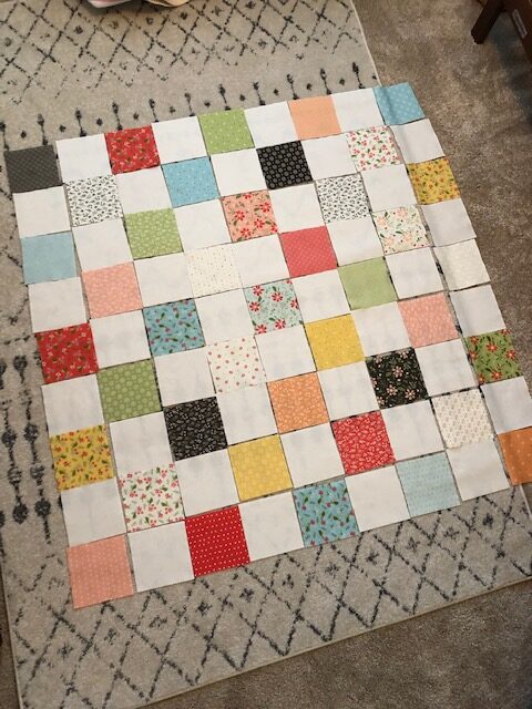 This beginner level DIY baby quilt was so fun and easy to make. You can make your own simple homemade baby quilt with pre cut squares, too.