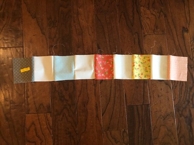 This beginner level DIY baby quilt was so fun and easy to make. You can make your own simple homemade baby quilt with pre cut squares, too.