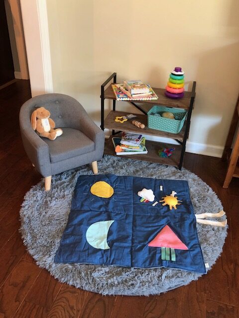 Make a baby play area in a living room, even in a small house, to give your child their own space and keep the clutter down.
