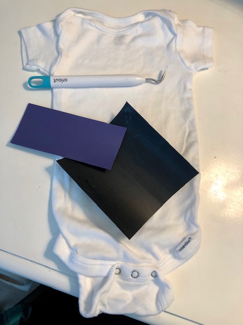 This is a fun, easy, and quick Cricut project! Make this DIY baby Halloween onesie for baby's first Halloween. Perfect Cricut beginner project.
