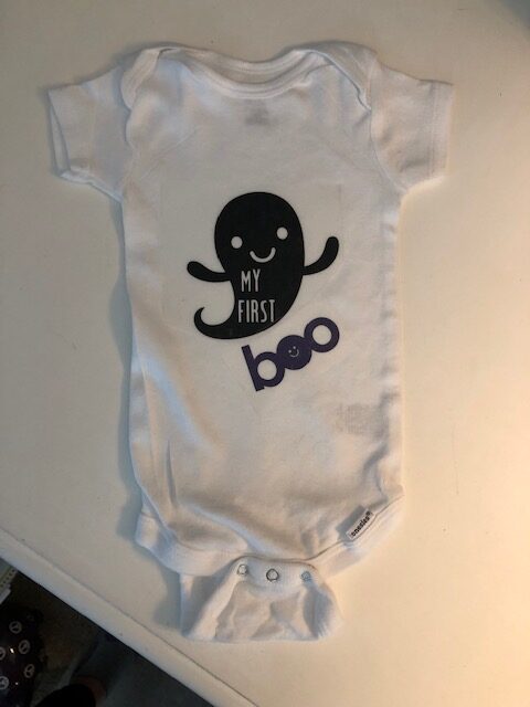 This is a fun, easy, and quick Cricut project! Make this DIY baby Halloween onesie for baby's first Halloween. Perfect Cricut beginner project.