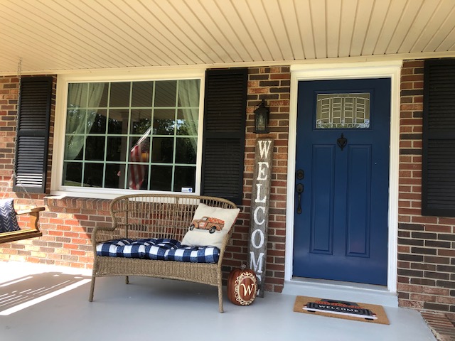 The easy and frugal way to update your front porch or patio is to paint or stain the concrete front porch floor. A great DIY project to tackle this weekend!