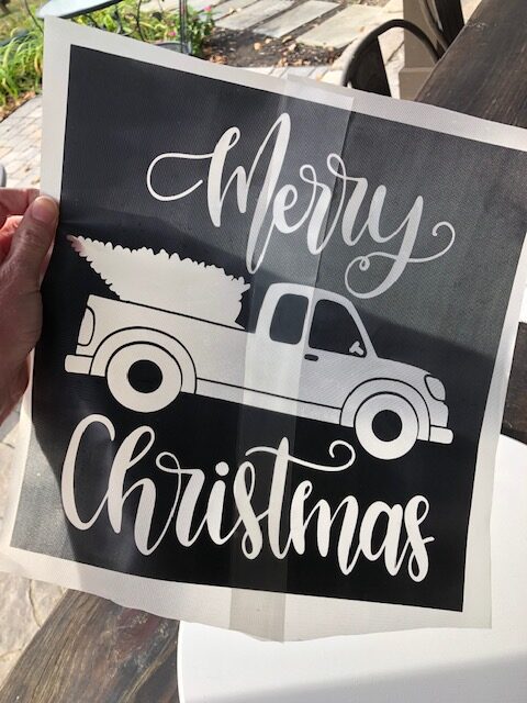 Make this simple, quick, and easy $10 DIY Christmas wooden door hanger with your Cricut machine. Perfect for DIY Christmas decor or a DIY gift!