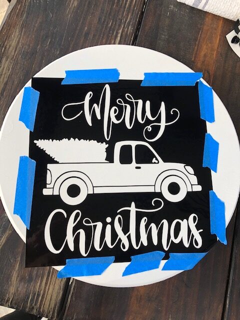 Make this simple, quick, and easy $10 DIY Christmas wooden door hanger with your Cricut machine. Perfect for DIY Christmas decor or a DIY gift!