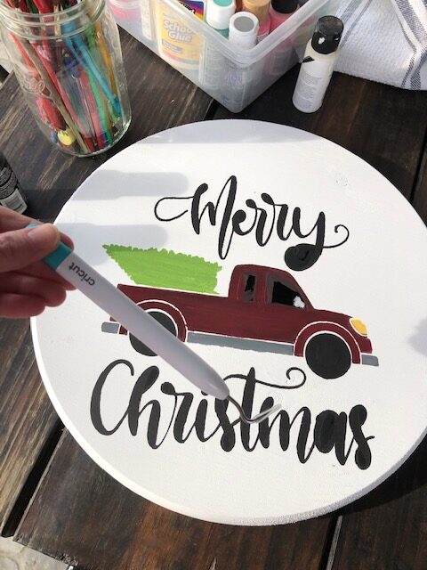 Make this simple, quick, and easy $10 DIY Christmas wooden door hanger with your Cricut machine. Perfect for DIY Christmas decor or a DIY gift!