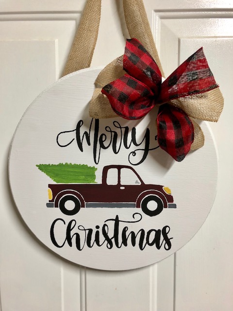 Make this simple, quick, and easy $10 DIY Christmas wooden door hanger with your Cricut machine. Perfect for DIY Christmas decor or a DIY gift!
