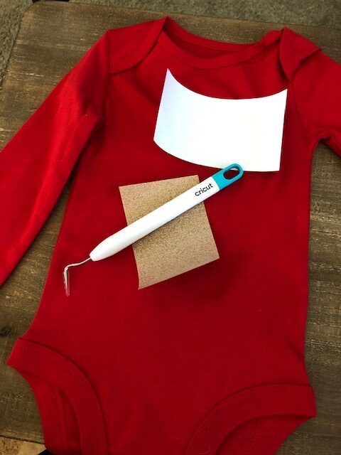 Make your own DIY Christmas bodysuits for baby with this easy beginner Cricut project. These simple iron on designs are quick to make and so cute!