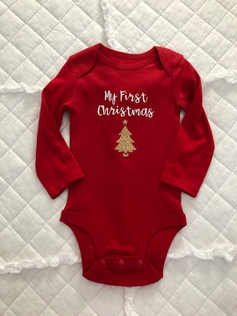Make your own DIY Christmas bodysuits for baby with this easy beginner Cricut project. These simple iron on designs are quick to make and so cute!