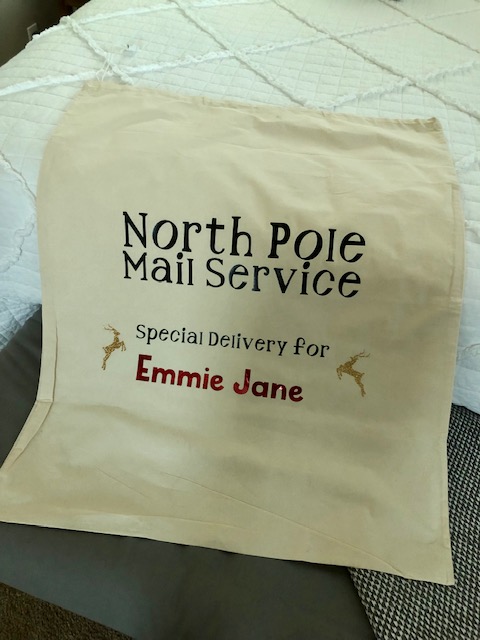 Make Christmas morning extra magical for your kids with this simple, frugal, and quick DIY personalized Santa sack project with your Cricut machine.