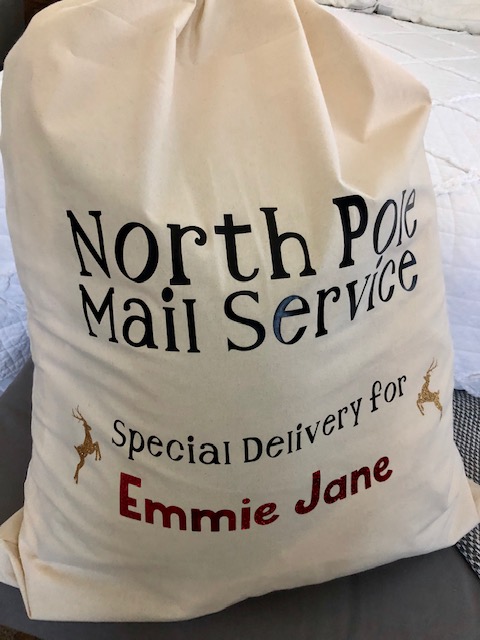 Make Christmas morning extra magical for your kids with this simple, frugal, and quick DIY personalized Santa sack project with your Cricut machine.