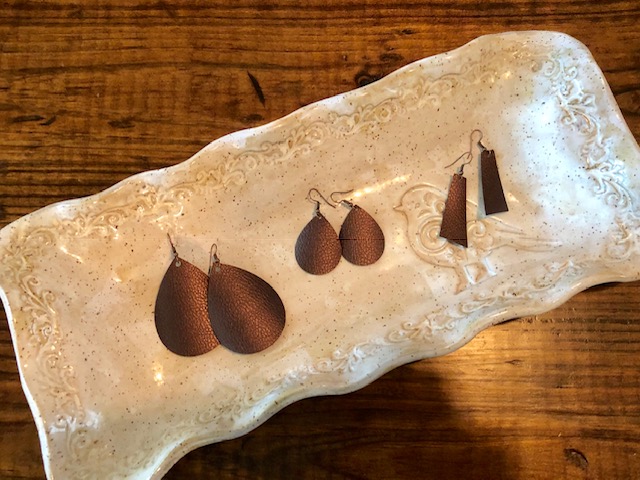 Make your own DIY Cricut faux leather earrings with this quick, easy, and frugal step by step project using the Cricut Joy. These make fun gifts, too!