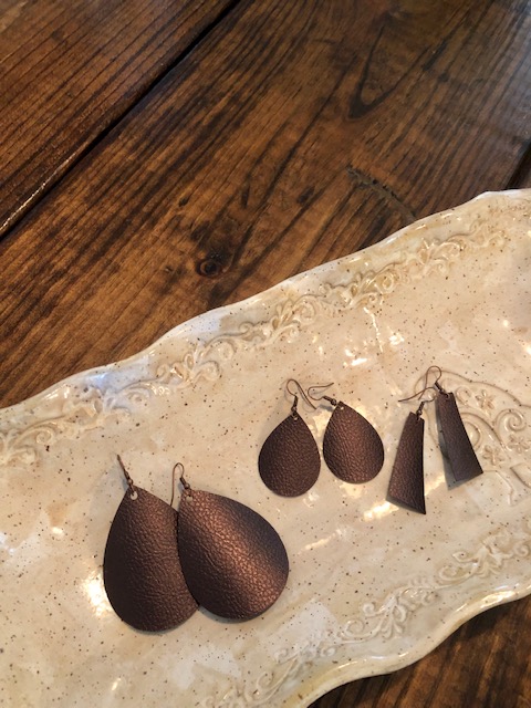 Make your own DIY Cricut faux leather earrings with this quick, easy, and frugal step by step project using the Cricut Joy. These make fun gifts, too!