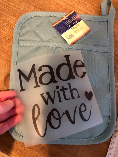Make this simple, easy, and frugal Dollar Tree DIY iron on potholder for a quick gift for a neighbor, teacher, friend, coworker, or grandparents!