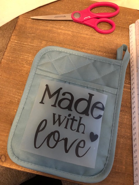 Make this simple, easy, and frugal Dollar Tree DIY iron on potholder for a quick gift for a neighbor, teacher, friend, coworker, or grandparents!