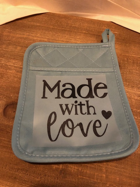 Make this simple, easy, and frugal Dollar Tree DIY iron on potholder for a quick gift for a neighbor, teacher, friend, coworker, or grandparents!