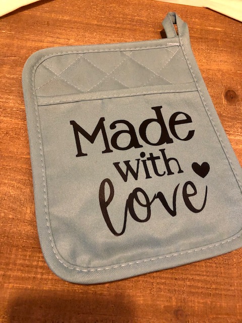 Make this simple, easy, and frugal Dollar Tree DIY iron on potholder for a quick gift for a neighbor, teacher, friend, coworker, or grandparents!