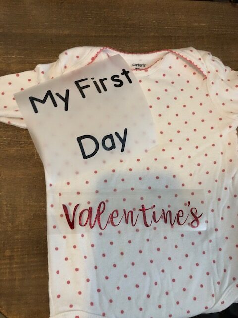 Make your own easy, quick, and frugal DIY Valentine's Day shirt for Baby with this step by step beginner Cricut iron on tutorial.