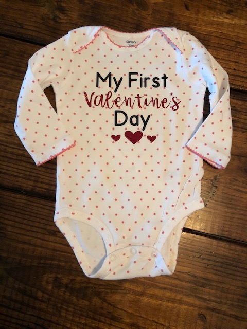 Make your own easy, quick, and frugal DIY Valentine's Day shirt for Baby with this step by step beginner Cricut iron on tutorial.
