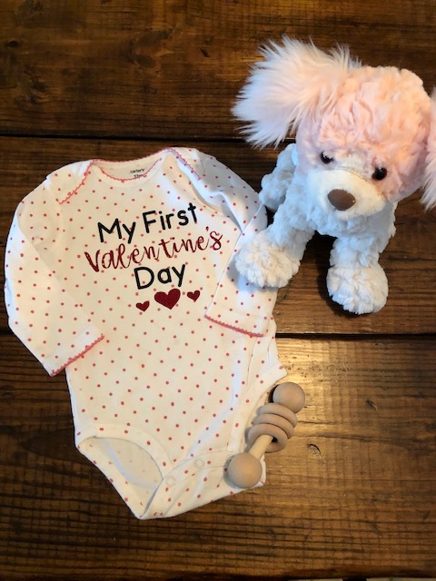 Make your own easy, quick, and frugal DIY Valentine's Day shirt for Baby with this step by step beginner Cricut iron on tutorial.