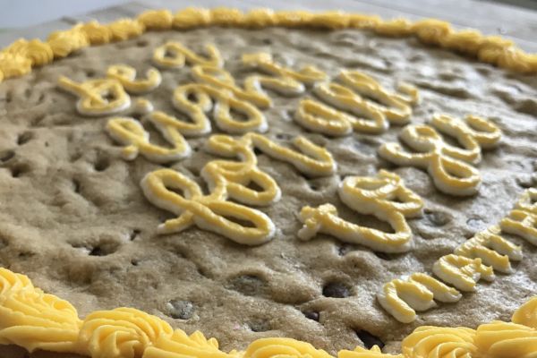 Want to start a cookie cake business from home? Learn how to turn your love of baking into extra income with tips for cottage food laws, pricing cookie cakes, finding customers, setting up a simple menu, marketing locally, and building a small home bakery business.